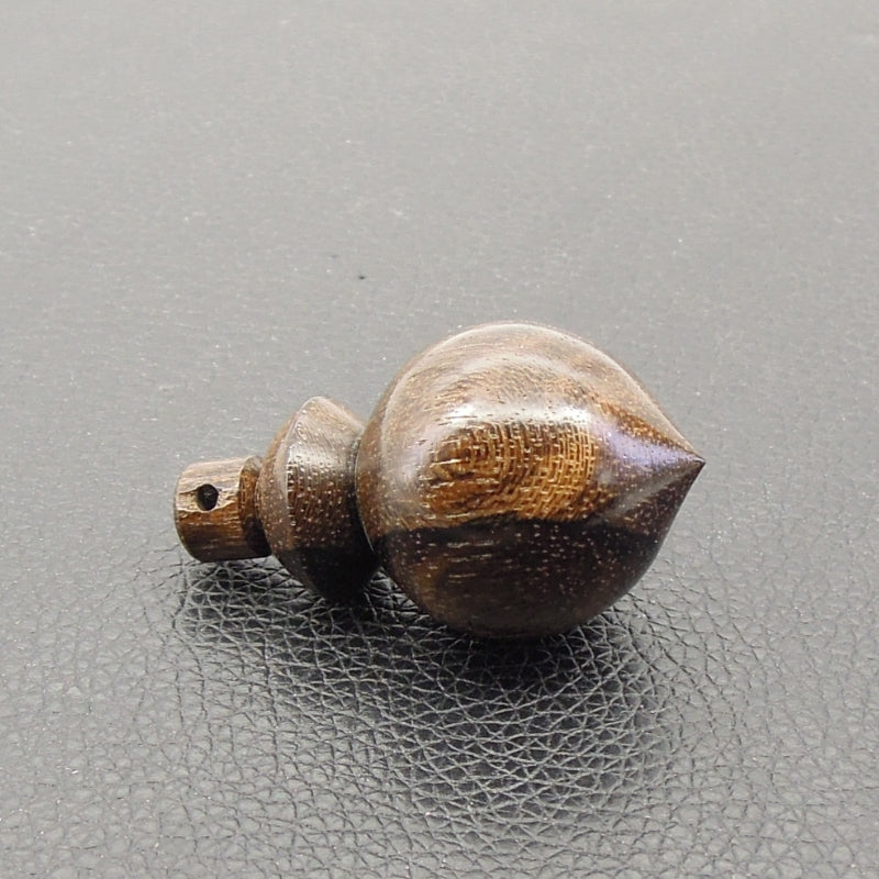 Pendule artisanal de radiesthésie en ziricote avec oeilleton.