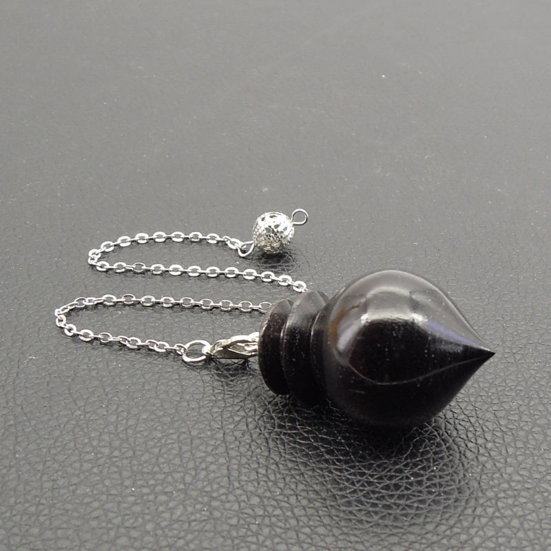 Pendule artisanal divinatoire de radiesthésie en ébène avec chainette.