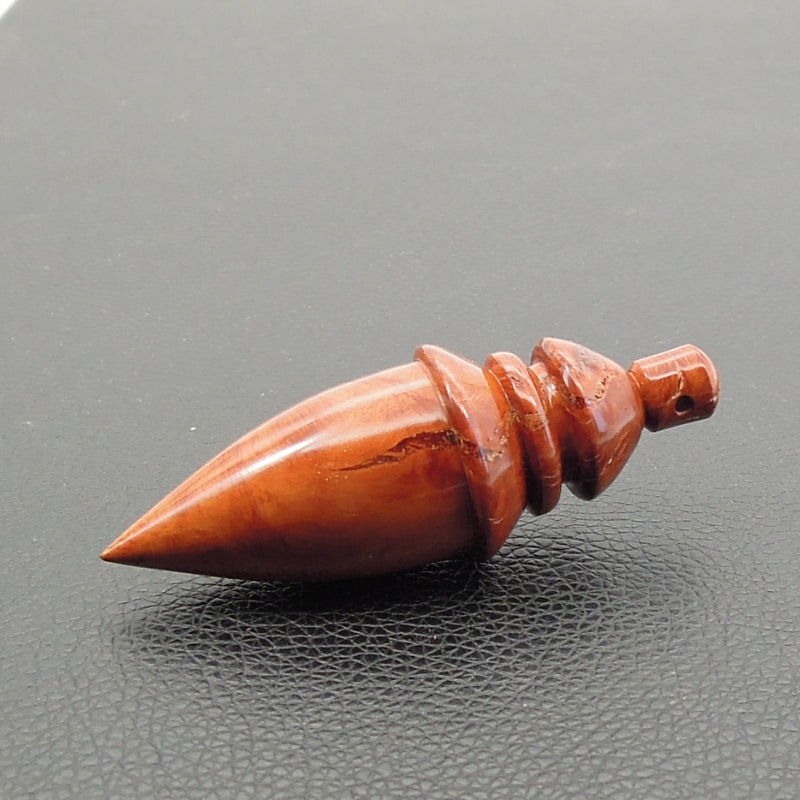 Pendule artisanal divinatoire en racine de bruyère avec oeilleton.