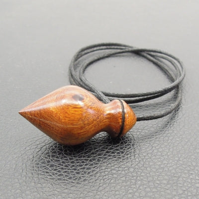 Pendule artisanal de radiesthésie en bois exotique avec cordon collé