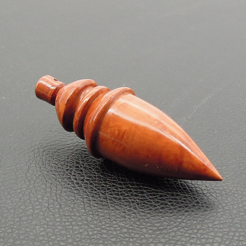 Pendule artisanal divinatoire en racine de bruyère avec oeilleton.