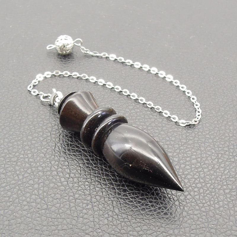 Pendule artisanal de radiesthésie en ébène avec chainette.