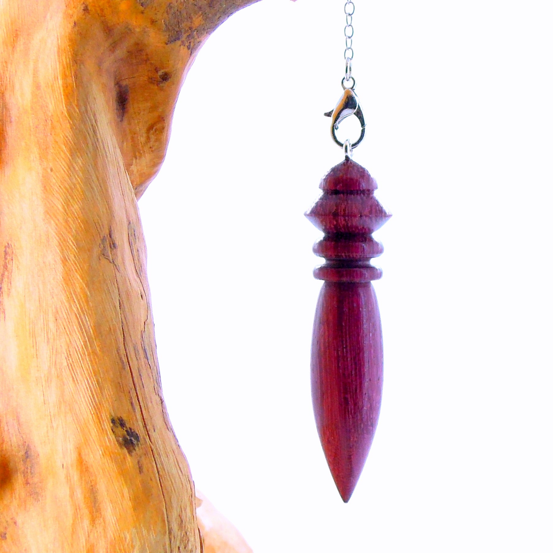 Pendule divinatoire artisanal en amarante.