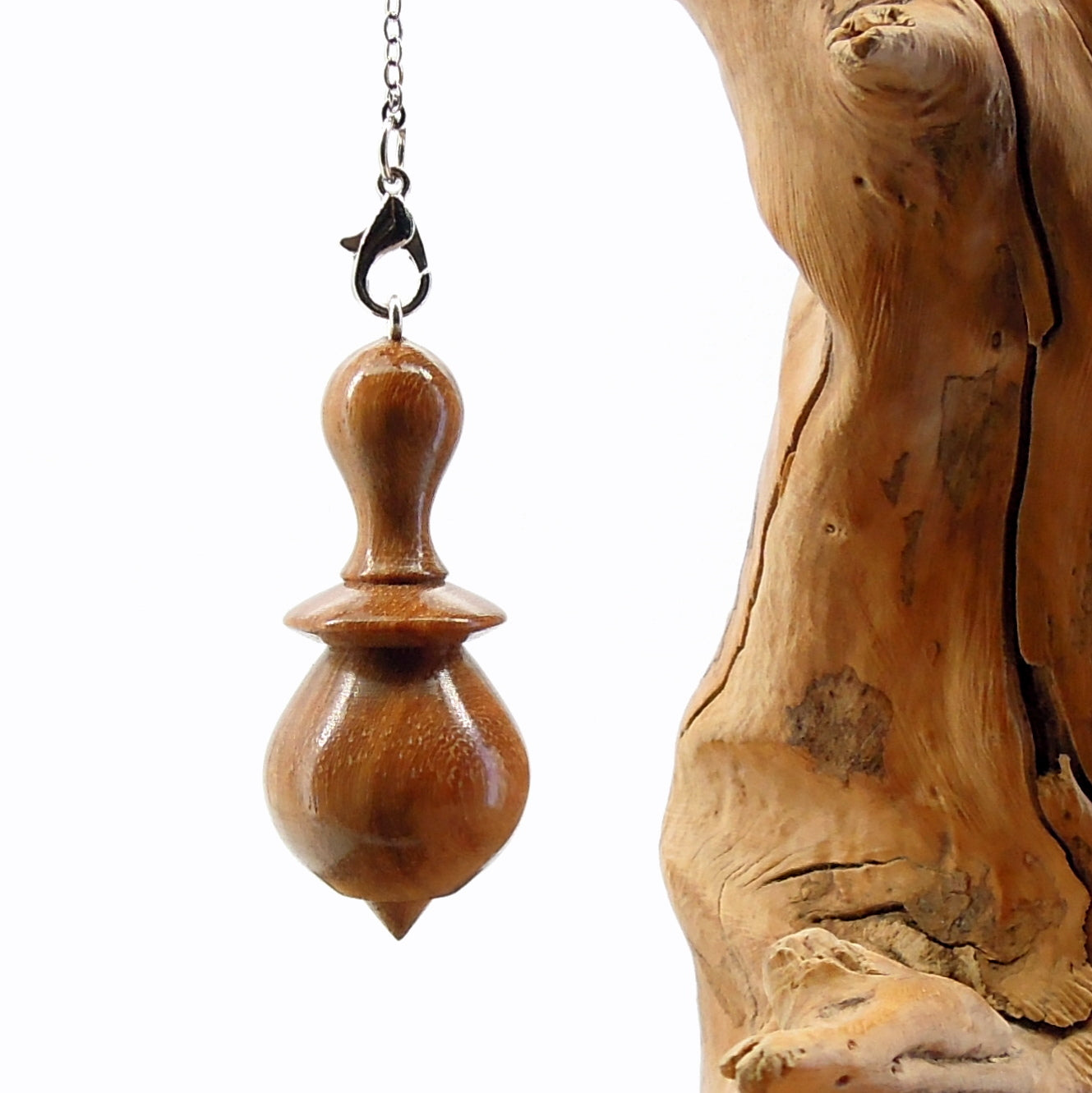 Pendule divinatoire artisanal en bois exotique