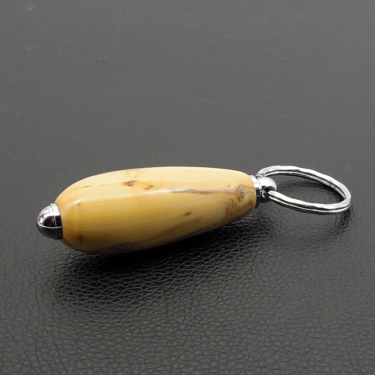 Porte clefs buis échauffé.