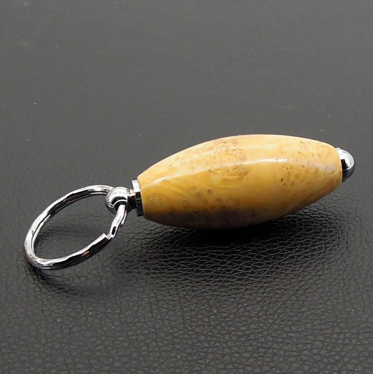 Porte clefs buis échauffé.