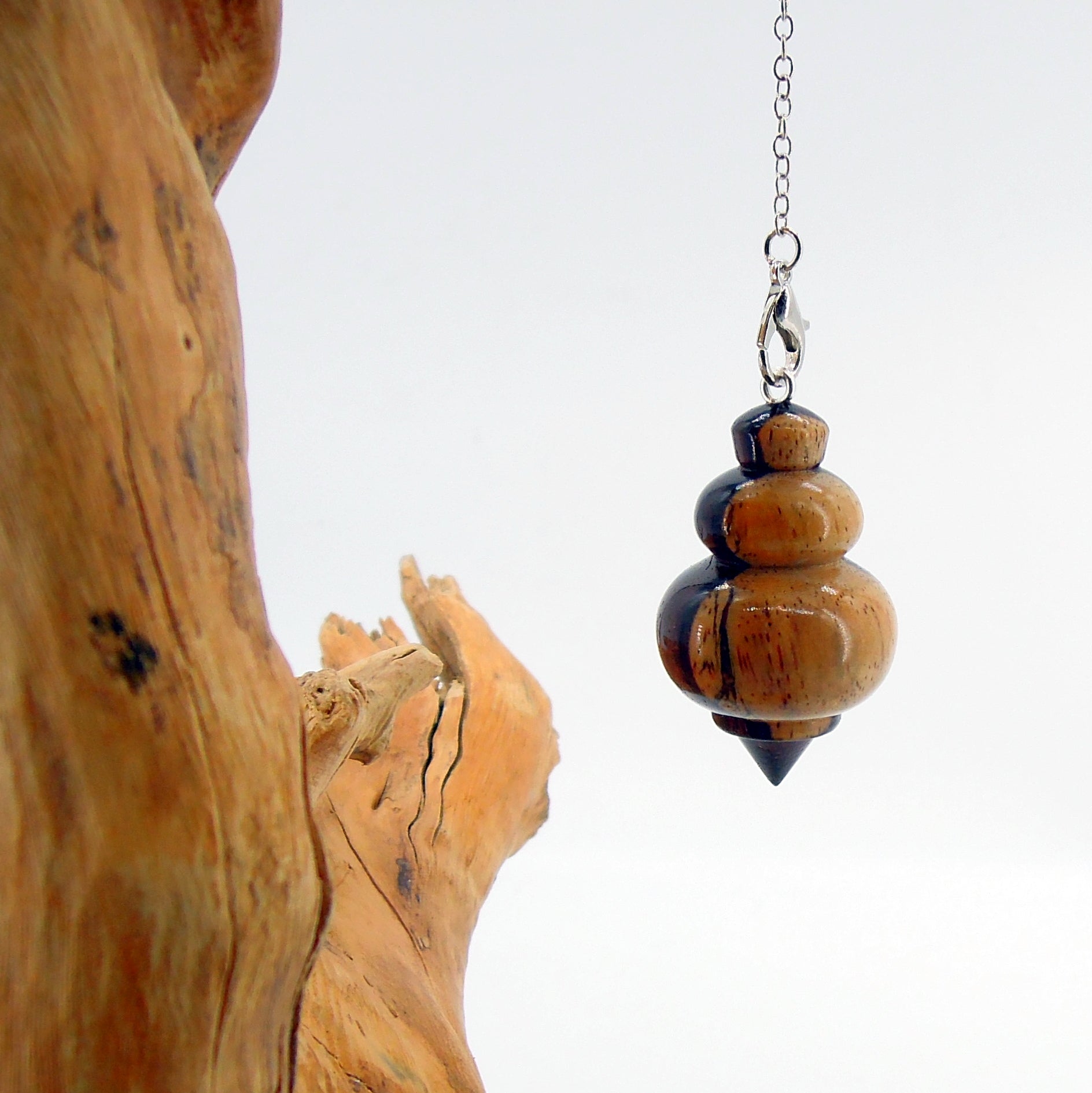 Pendule divinatoire artisanal en aubier et coeur de cocobolo
