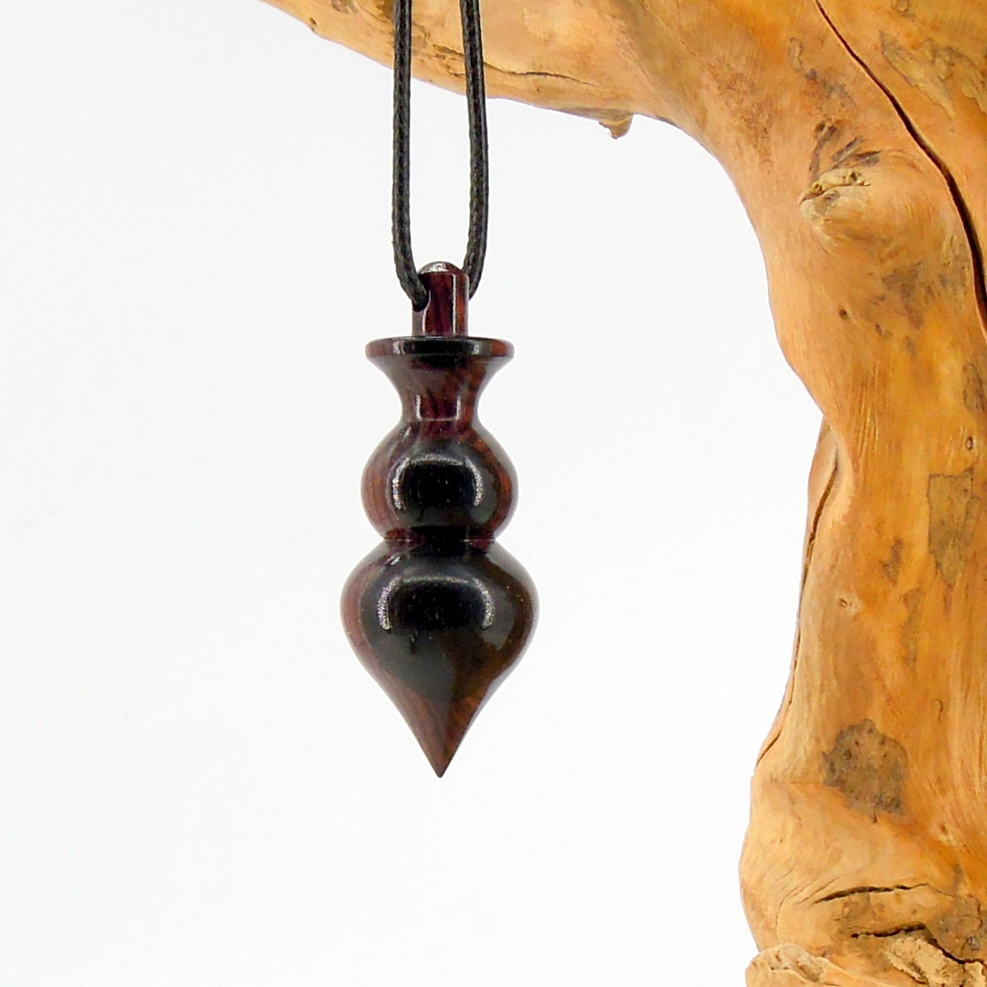 Pendule divinatoire artisanal en bois exotique et ébène avec oeilleton