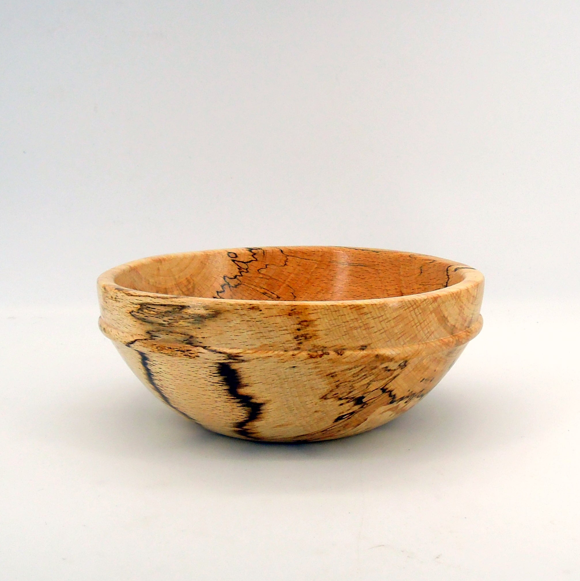 Coupe en bois de hêtre échauffé.