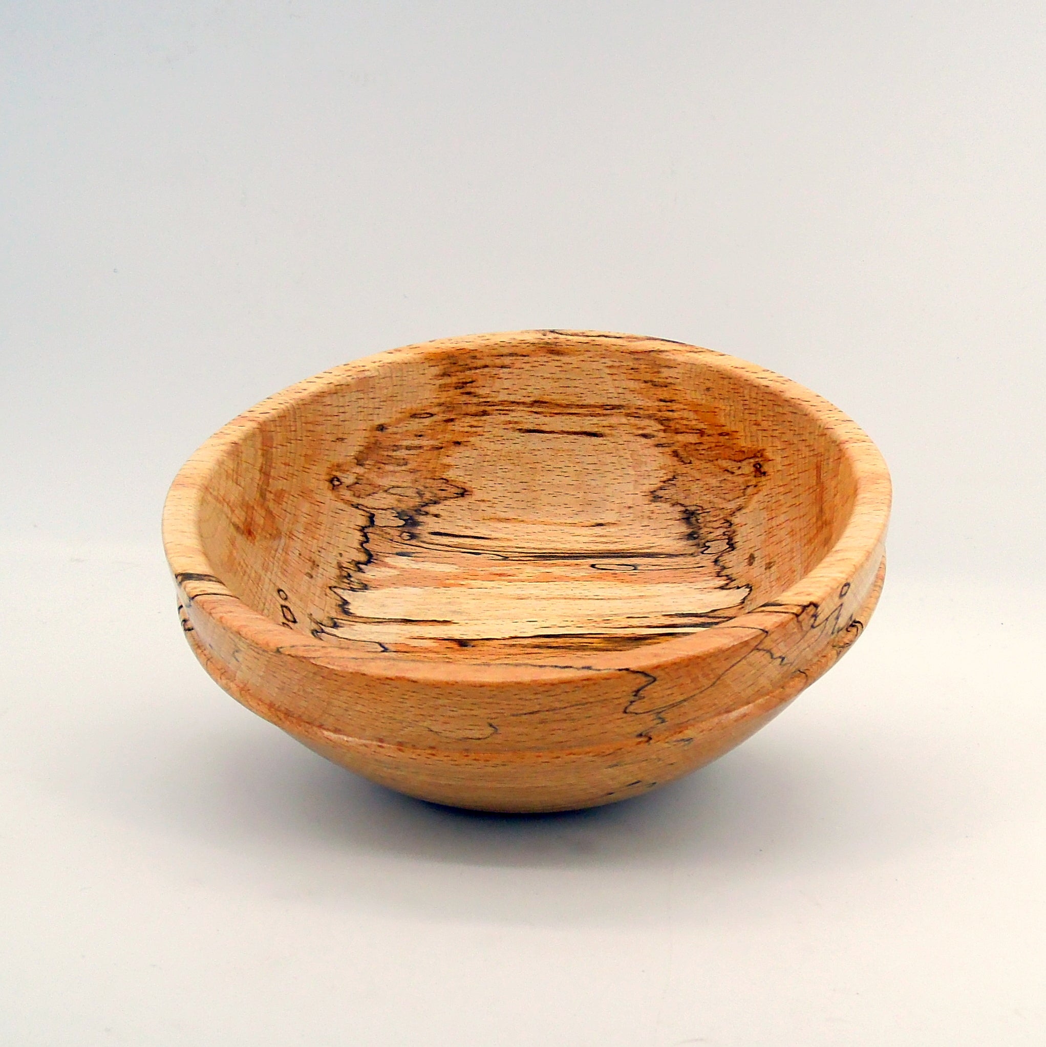 Coupe en bois de hêtre échauffé.