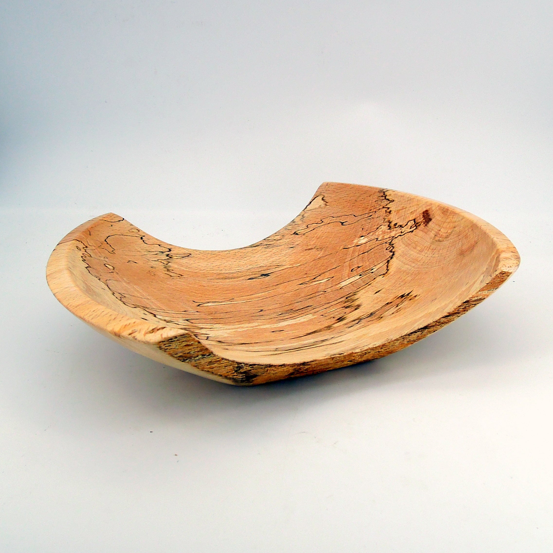 Vide poche en bois de hêtre échauffé.