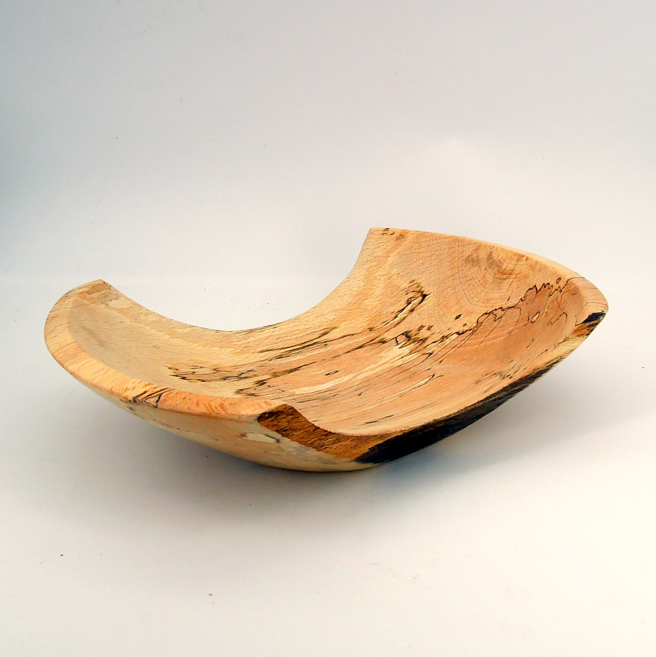 Vide poche en bois de hêtre échauffé.