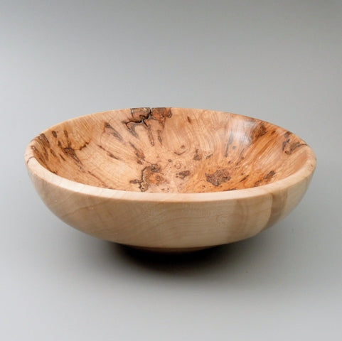 Coupe en bois d’érable de bourgogne avec présence de loupe.