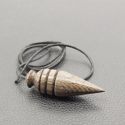 Pendule artisanal de radiesthésie en morta ou chêne des marais avec cordon collé
