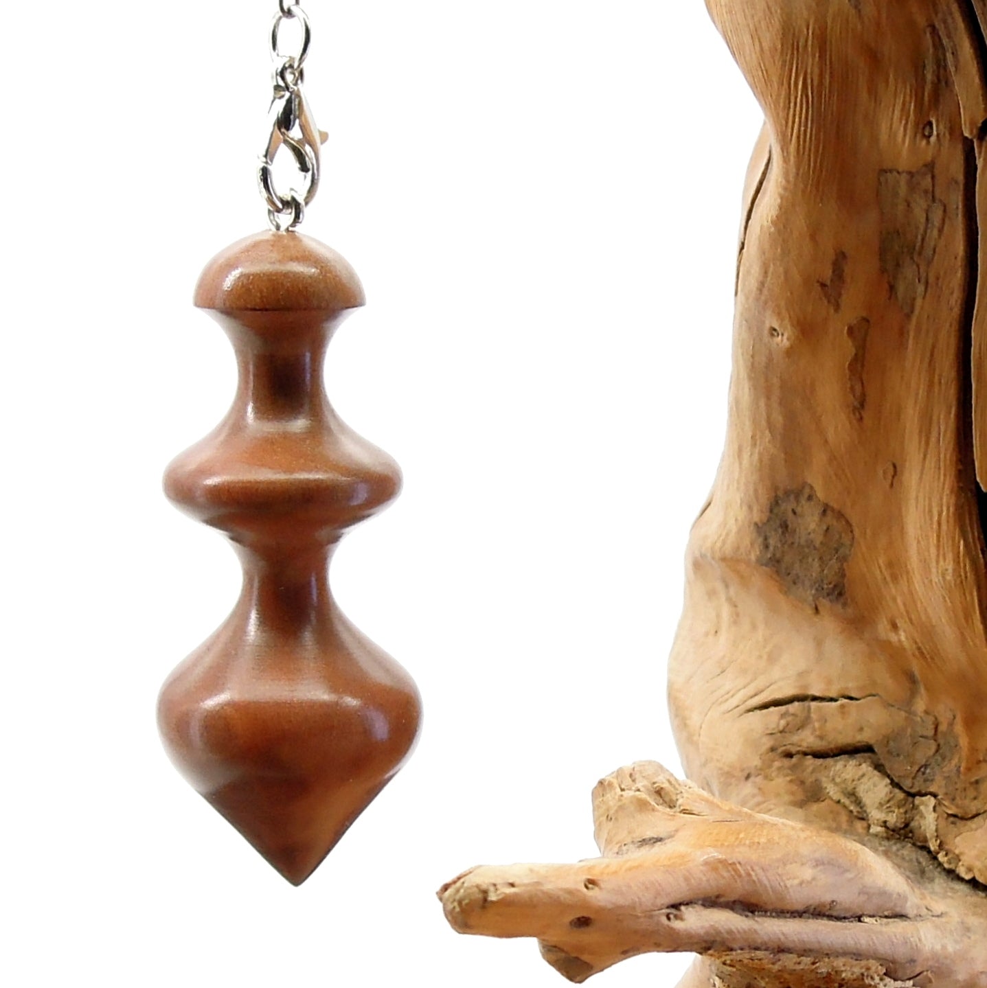 Pendule artisanal de radiesthésie en bois exotique avec chainette.