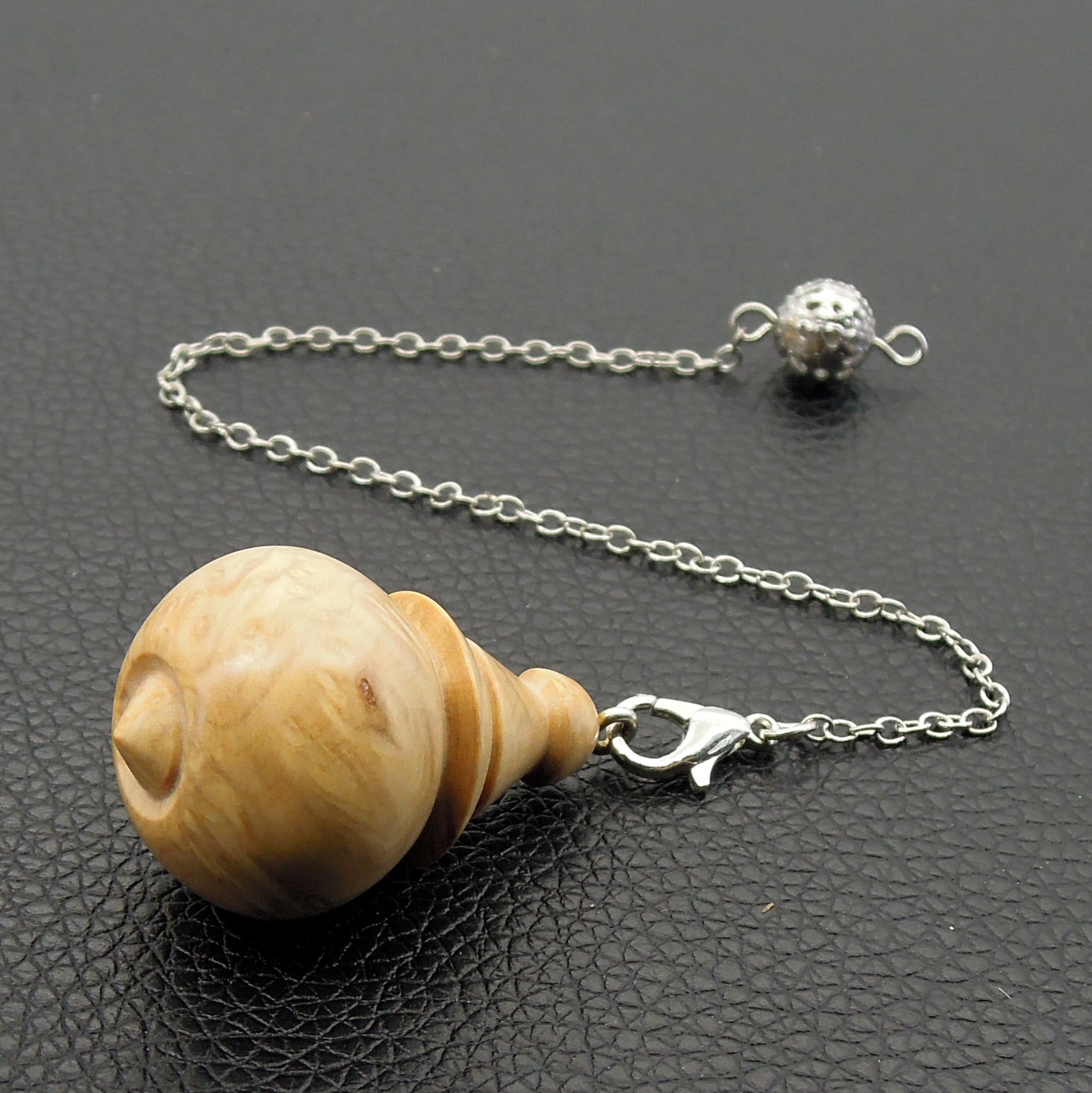 Pendule en loupe de buis