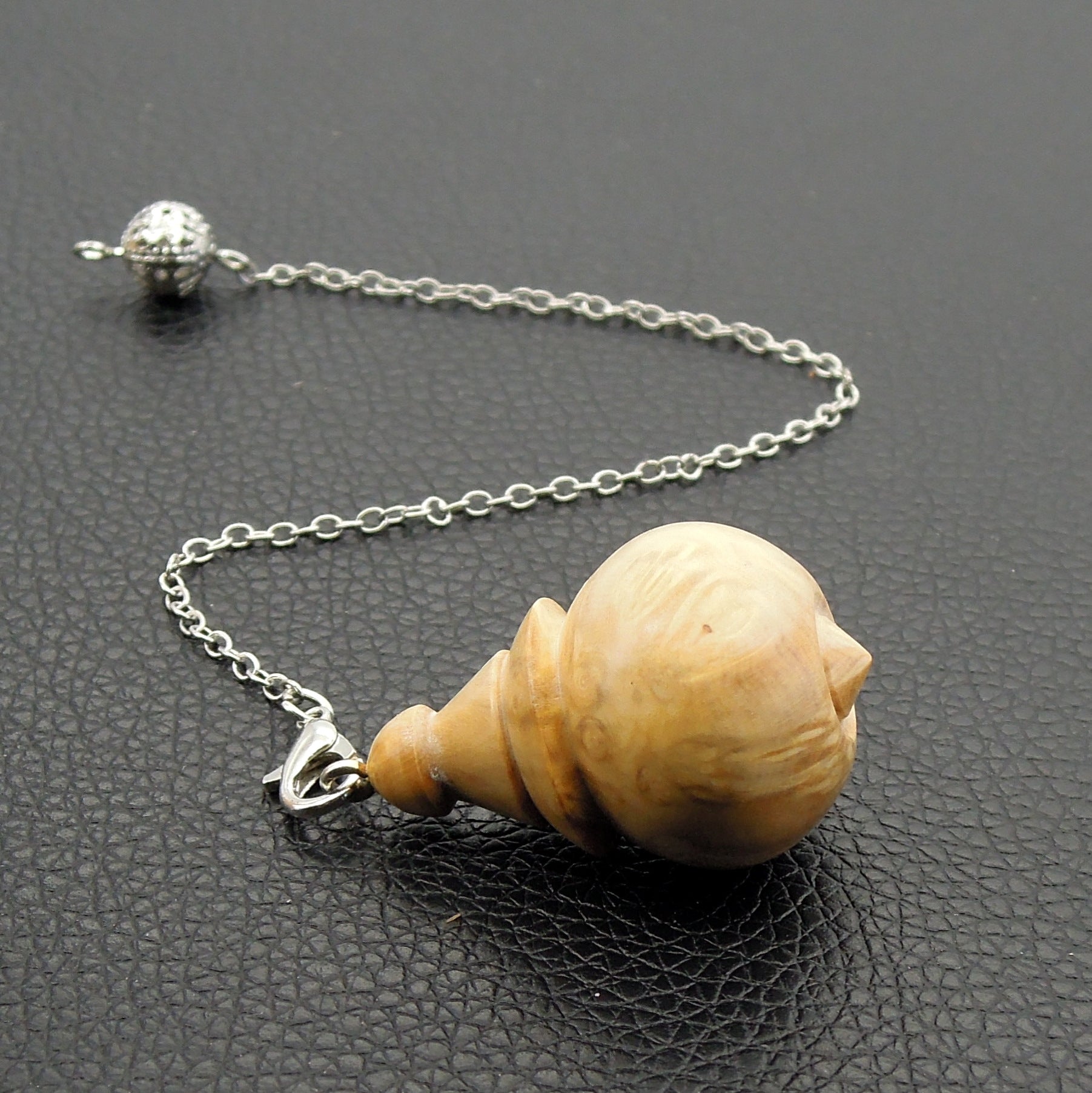 Pendule en loupe de buis