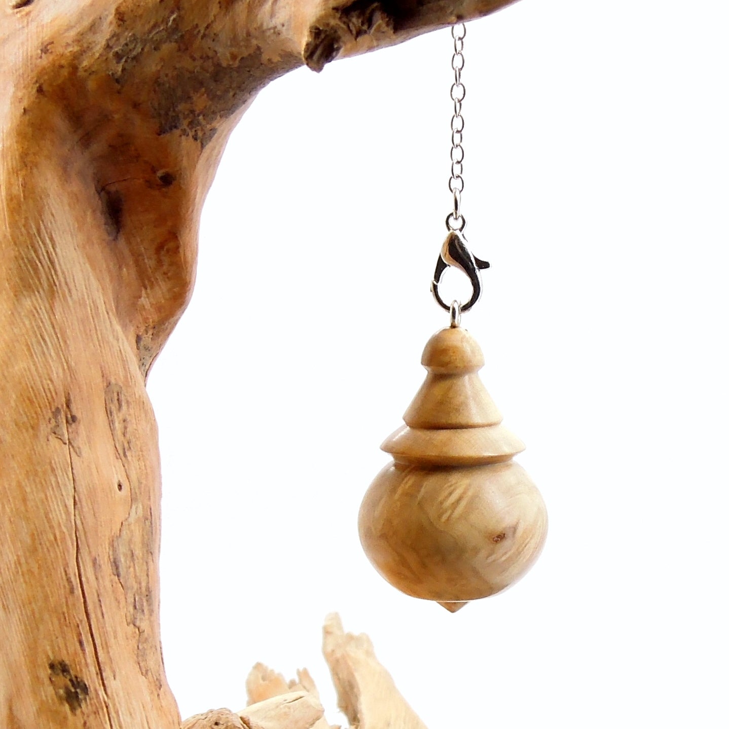 Pendule en loupe de buis