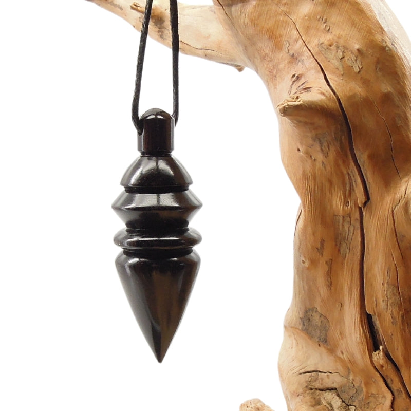 Pendule artisanal de radiesthésie en ébène avec oeilleton..