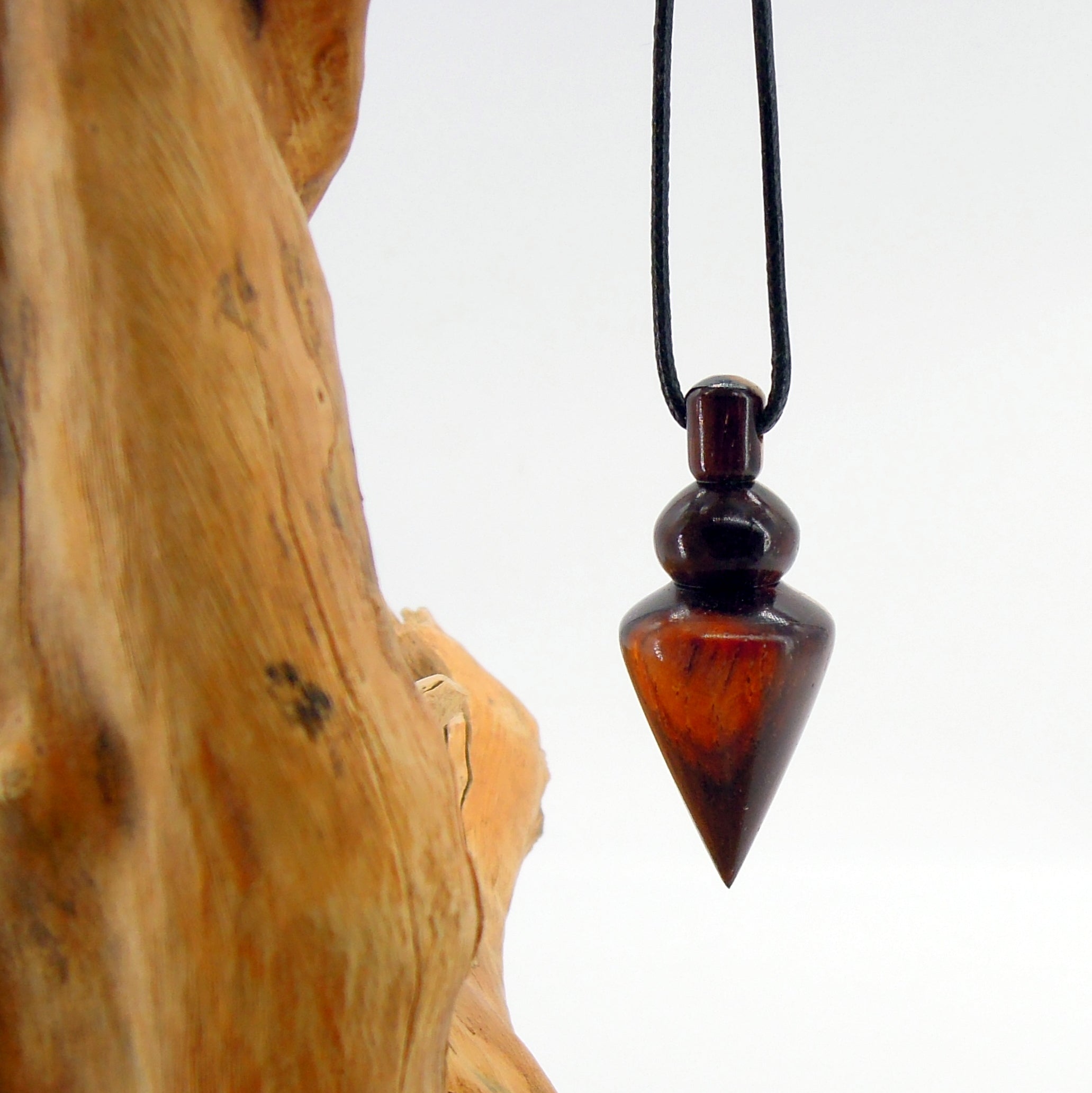 Pendule artisanal en cocobolo avec oeilleton